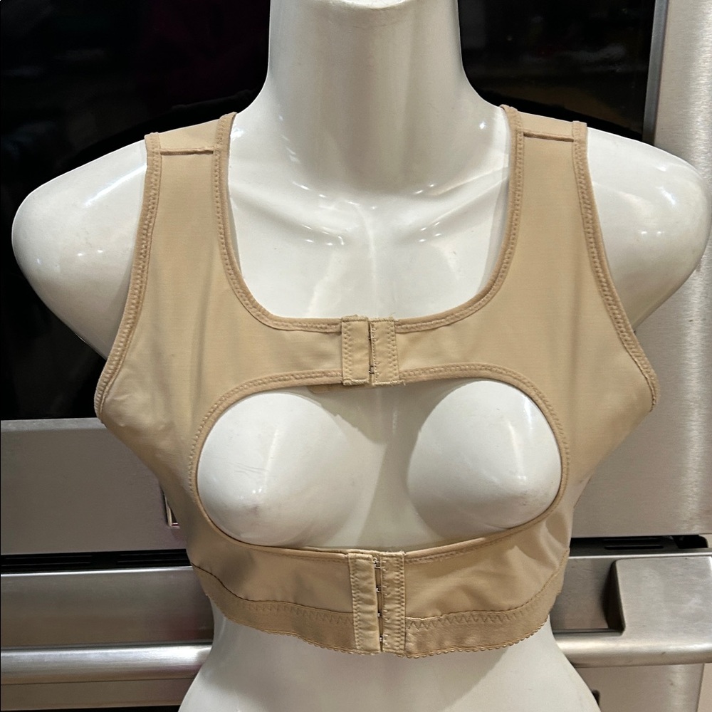 Tan posture and back support to wear over a bra.